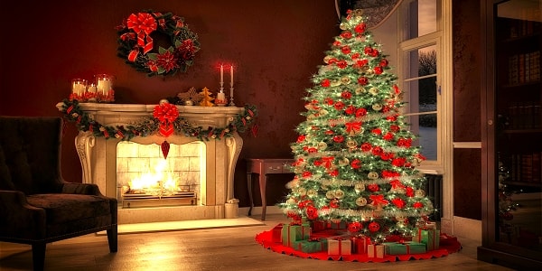 Christmas tree and fire place with festive Christmas decorations 