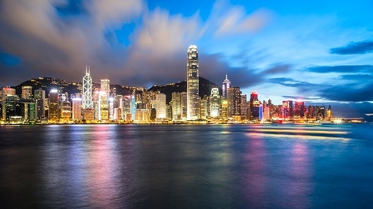 Victoria Harbour in Hong Kong with business district skyscrapers